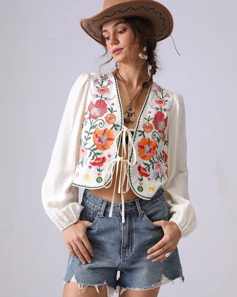 Broderad blus med blommor