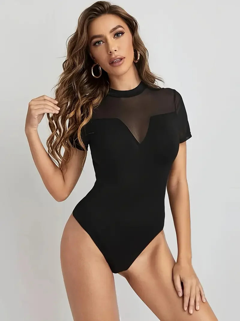 Figurnära blus med transparent mesh
