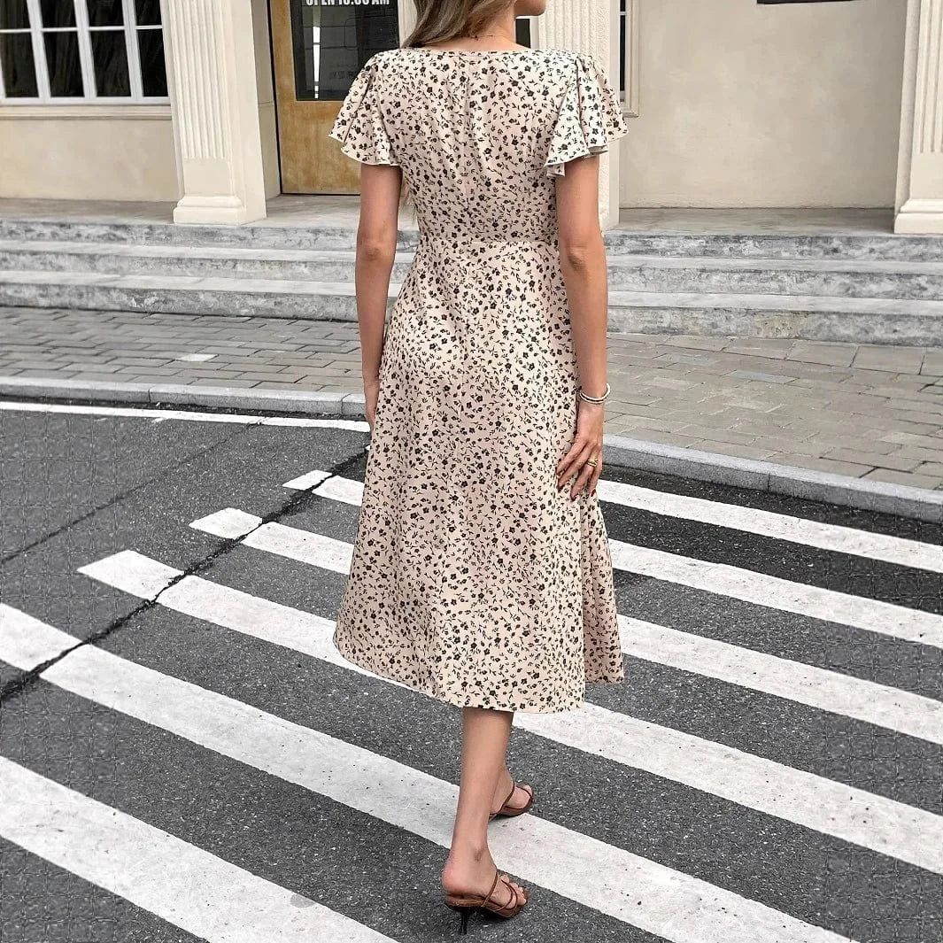 Beige blommig midiklänning