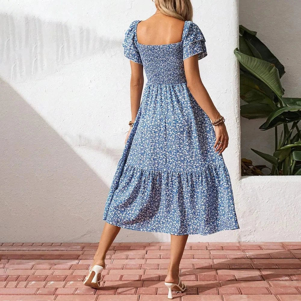 Blå blommig klänning