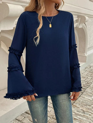 Blus med trumpetärm