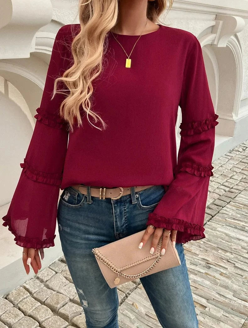 Blus med trumpetärm