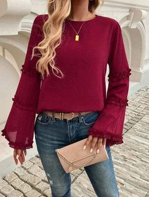 Blus med trumpetärm