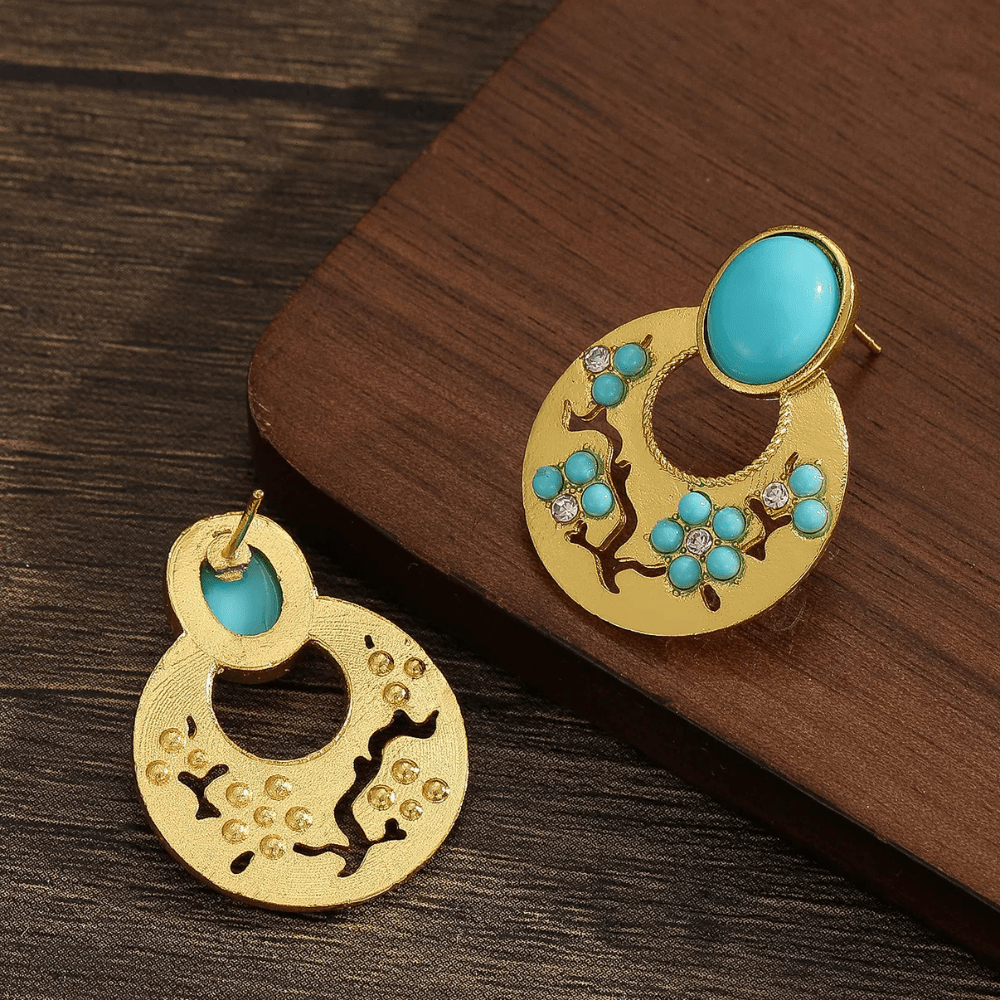 Bohemiska guldörhängen med turkos blomma