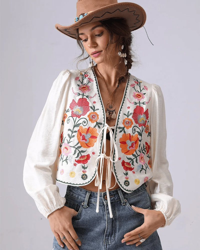 Broderad blus med blommor