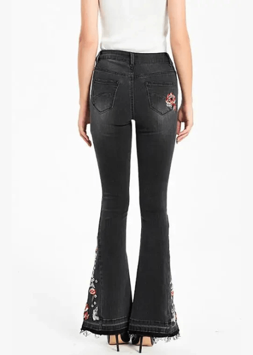 Broderade svarta flare jeans med blommönster