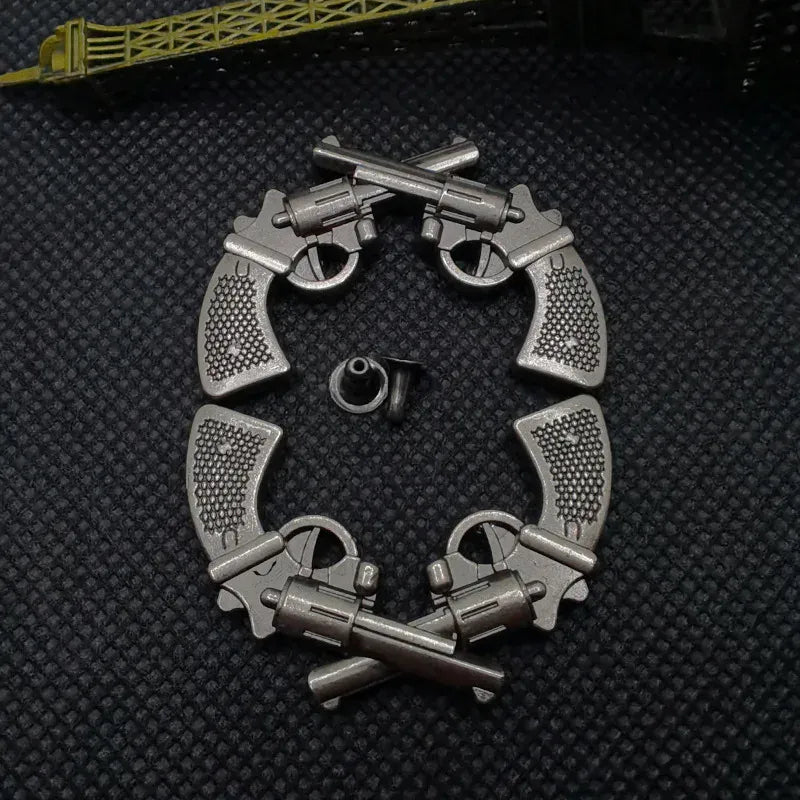 Concho antik metall med korsade revolvrar