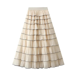Kjol i våder med svarta kantband Ljusbeige / One Size
