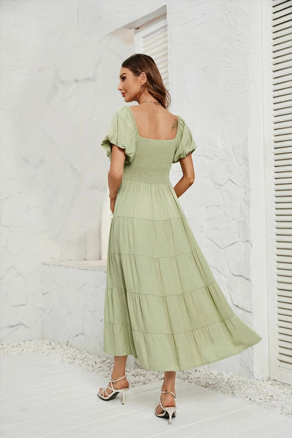 Klänning med smock i midjan