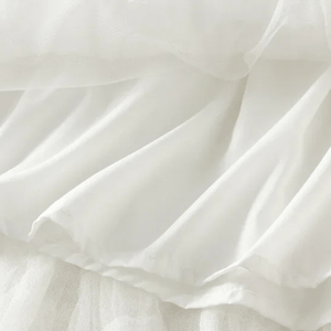 Lång tyllkjol med kaskadvolanger