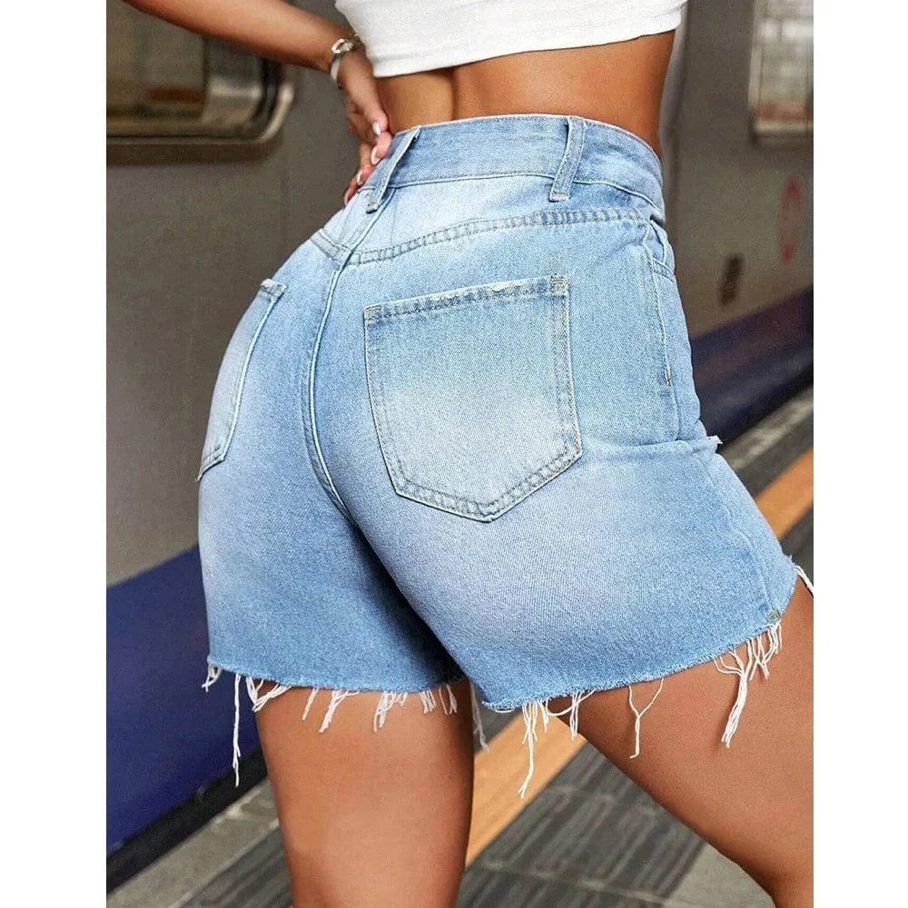 Ljusblå ripped jeans shorts
