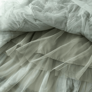 Maxikjol med kaskader av tyllvolanger