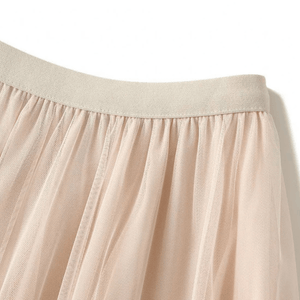 Maxikjol med kaskader av tyllvolanger