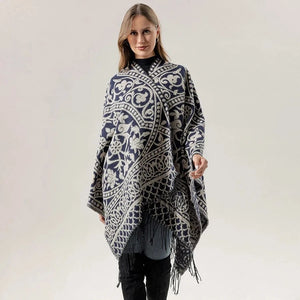 Öppen poncho med blommigt jacquardmönster