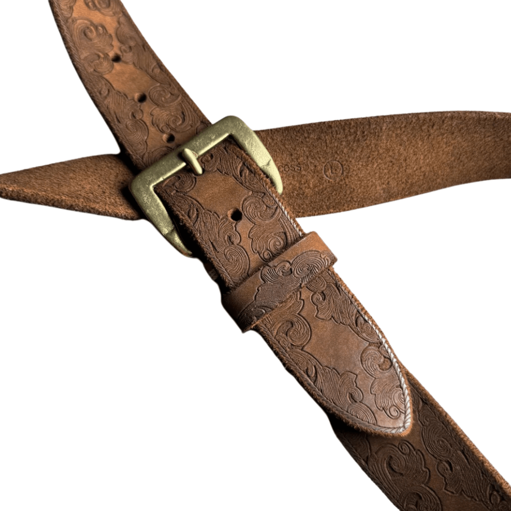 Präglat cowboybälte i äkta läder med mässingsspänne
