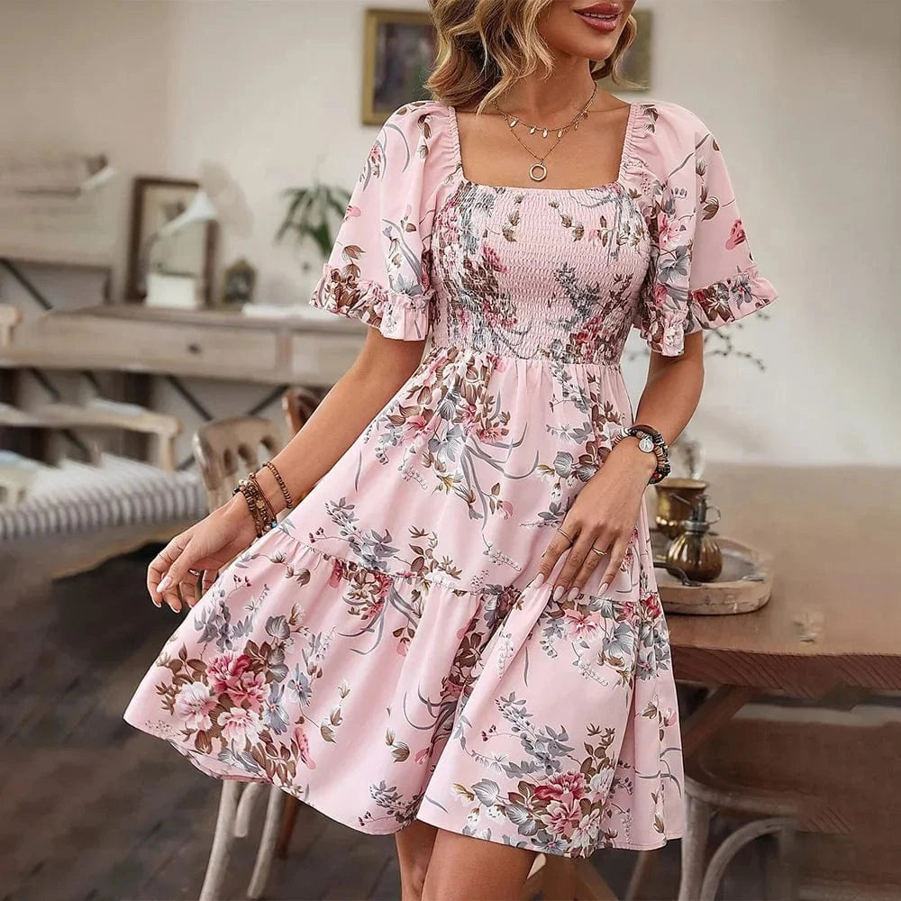 Rosa blommig klänning