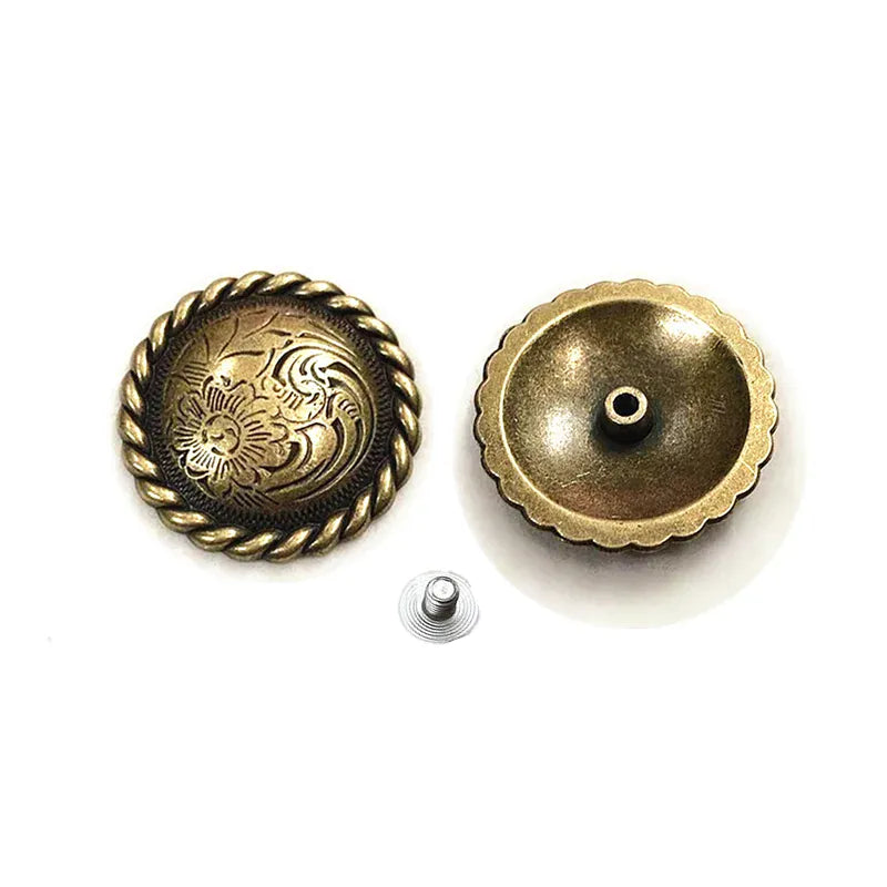 Rund concho med blomgravyr