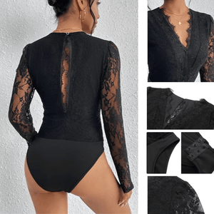 Svart blus i blommig spets