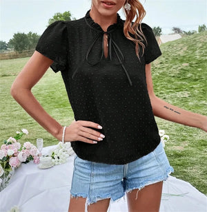 Svart blus med rosett