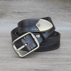 Westernbälte i äkta läder med präglat mönster och metallspänne