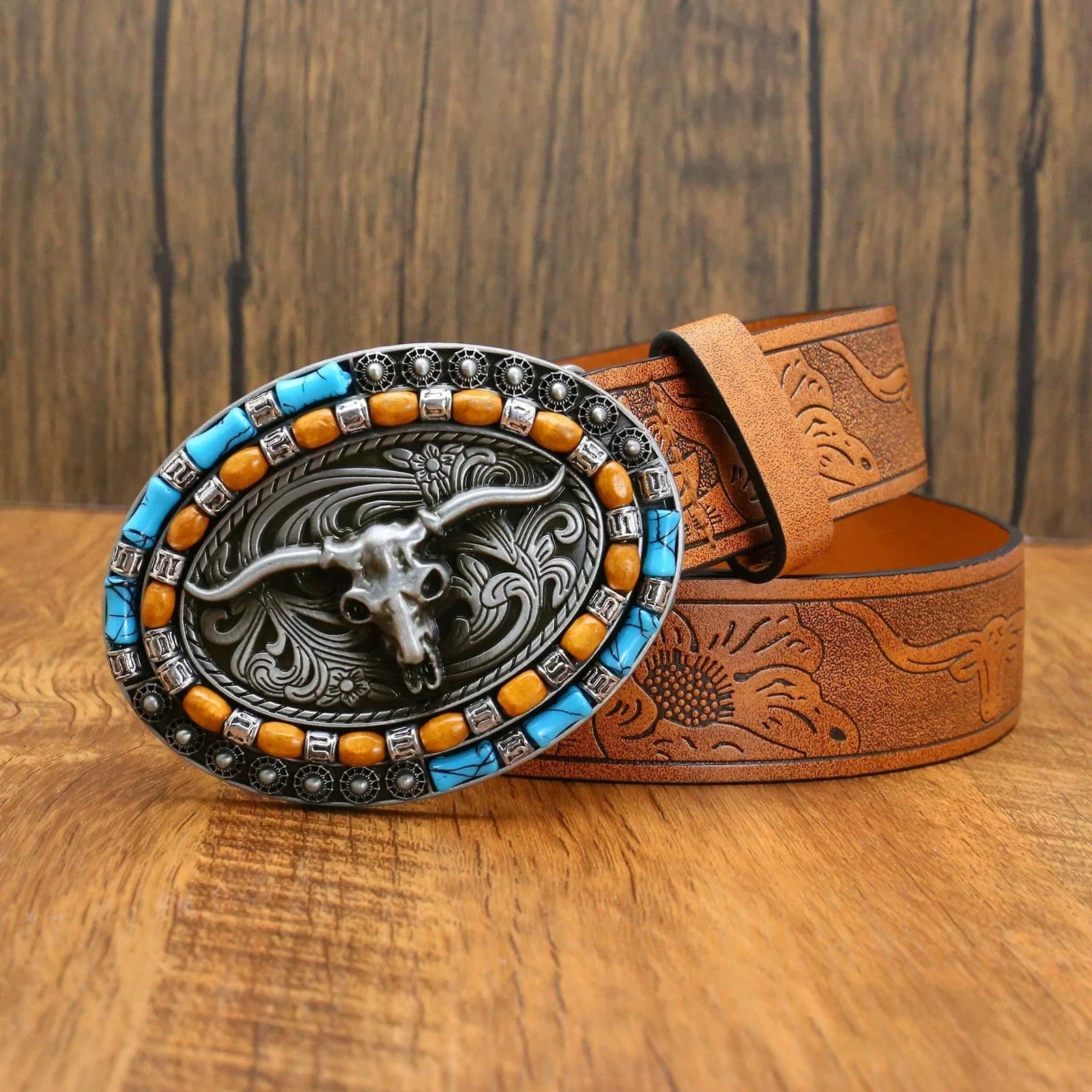 Westernbälte i präglat läder med turkoser och hornspänne