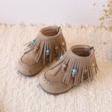 Mockasiner med fransar och pärldetaljer för små cowgirls