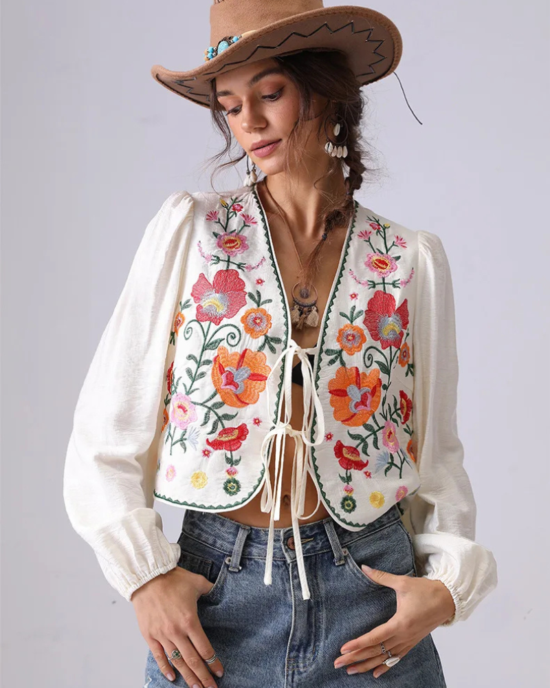 Broderad blus med blommor