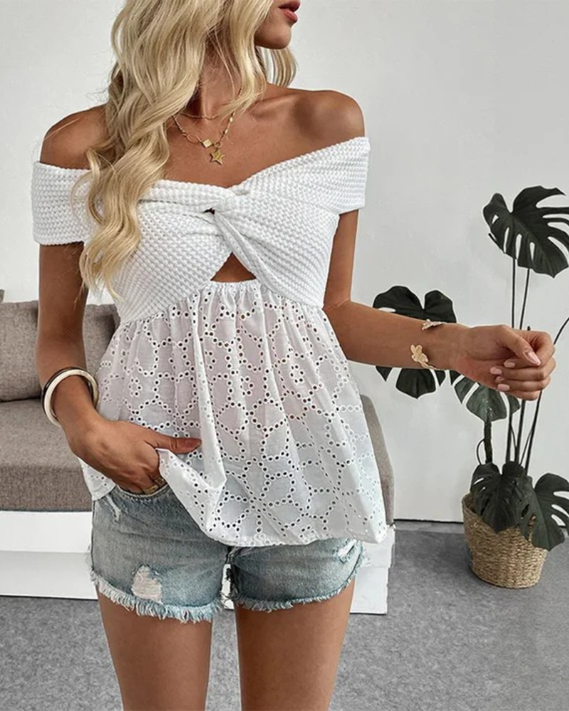 Vit off shoulder-blus i broderie anglaise med knutdetalj