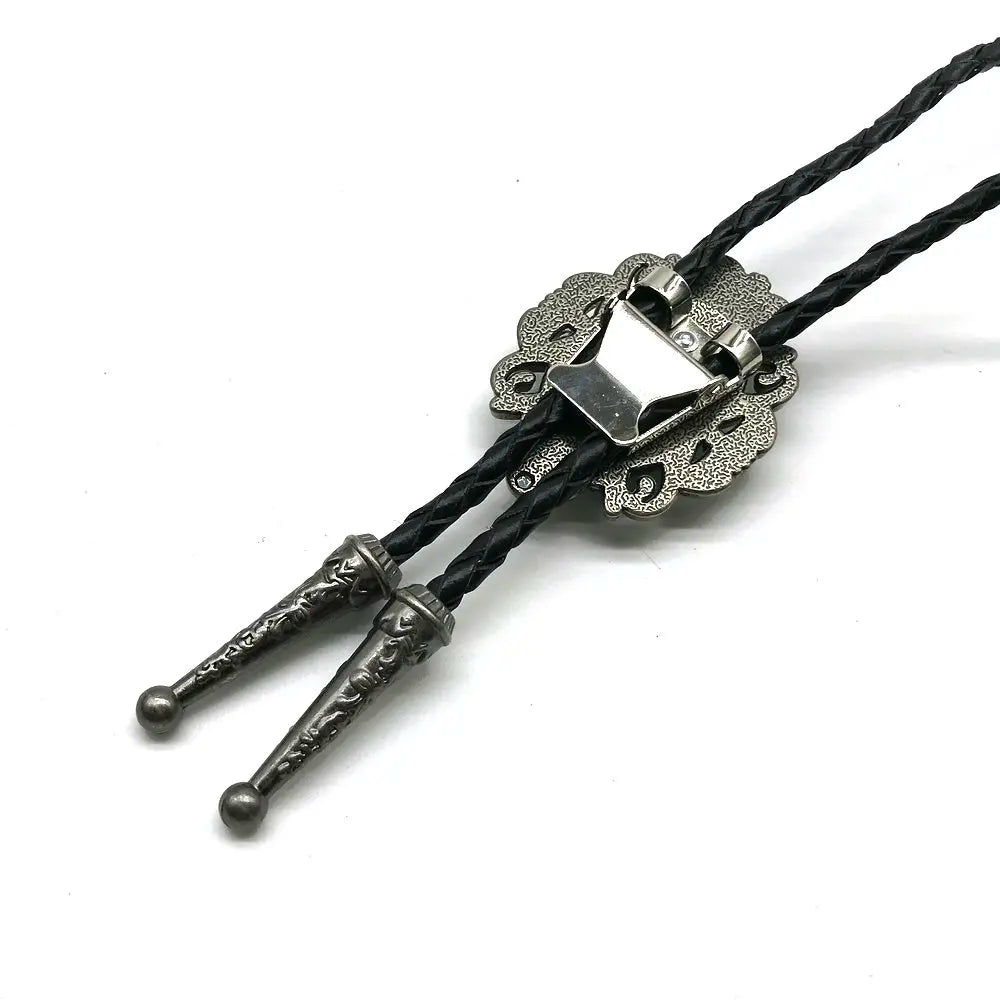 Bolo tie med svart sten och antiksilverdetaljer