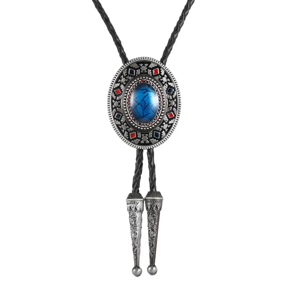 Bolo tie med oval sten och dekorativ antiksilverram