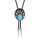 Bolo tie i silverfärgad björntassdesign med ädelstenslook
