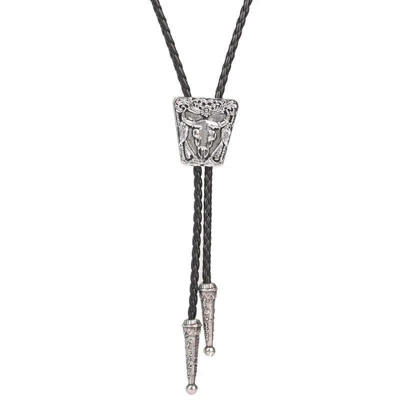 Bolo tie med oxskalle i metall och läderband