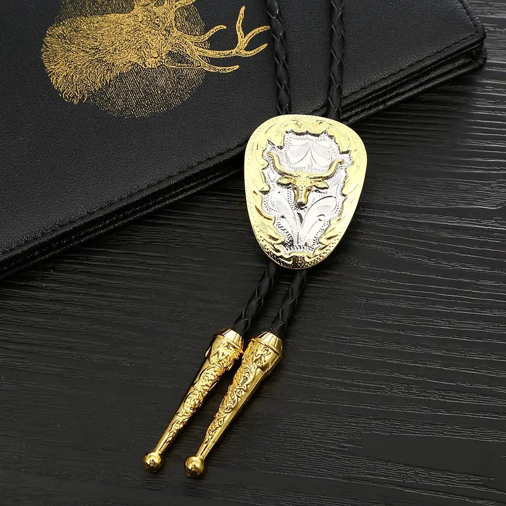 Bolo tie med tjurhuvud i guld och silver