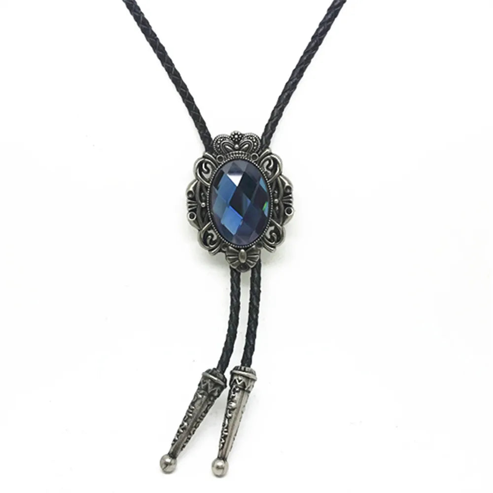 Bolo tie med oval glassten och vintagekrona