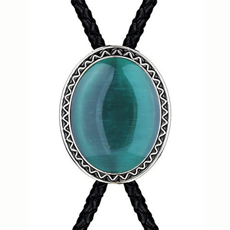 Bolo tie med blå glaskattöga och flätat lädersnöre