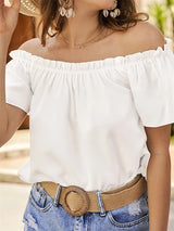 Vit off shoulder-blus med smockad ringning
