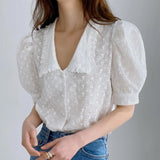 Blus med spetskrage
