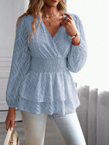 Smockad blus