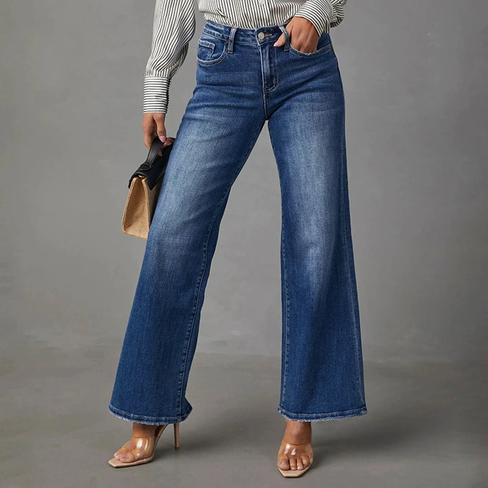 Högmidjade mörkblå vida jeans för dam