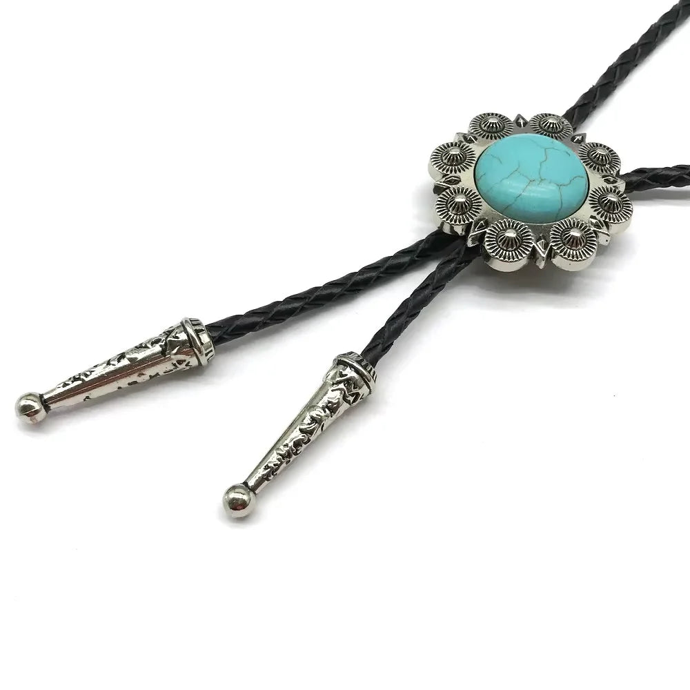 Bolo tie med rund turkossten och solformad medaljong