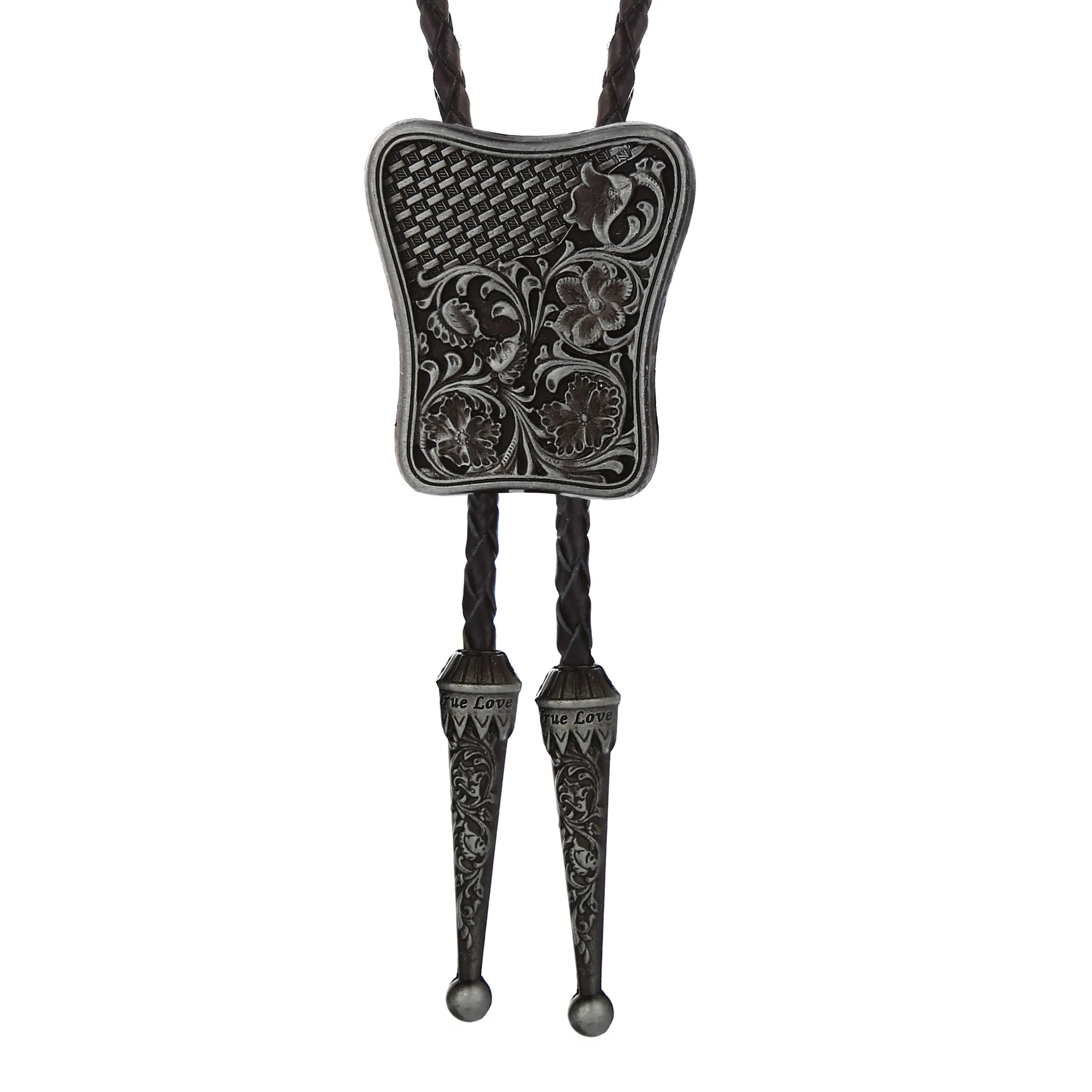Bolo tie i rektangulär mörk metall med blommigt vintagemönster