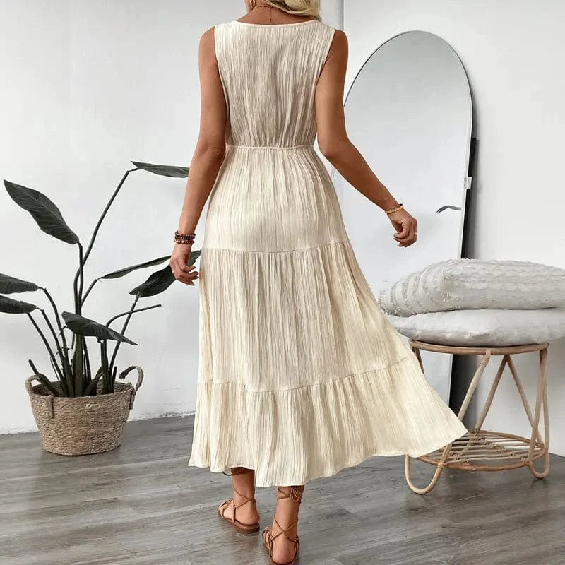 Beige klänning med volang