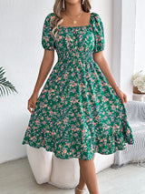 Blommig off-shoulder midiklänning