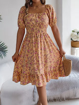 Blommig off-shoulder midiklänning