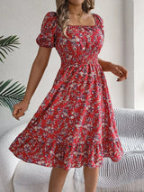 Blommig off-shoulder midiklänning