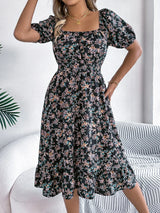 Blommig off-shoulder midiklänning