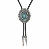 Bolo tie i solrosformad metallram och turkos sten