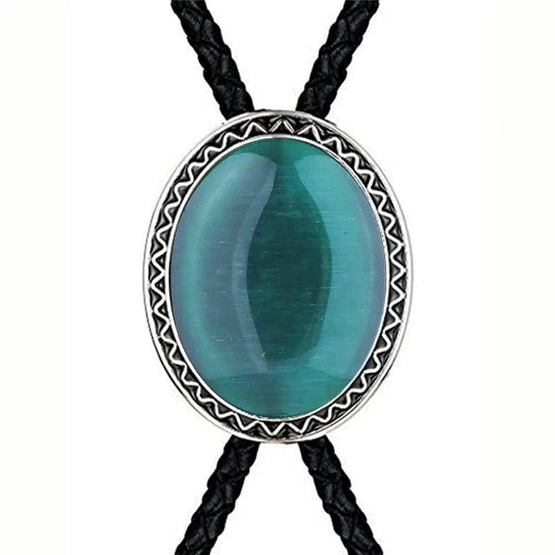 Bolo tie med blå glaskattöga och flätat lädersnöre