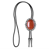 Bolo tie med brunt ovalt hänge i natursten