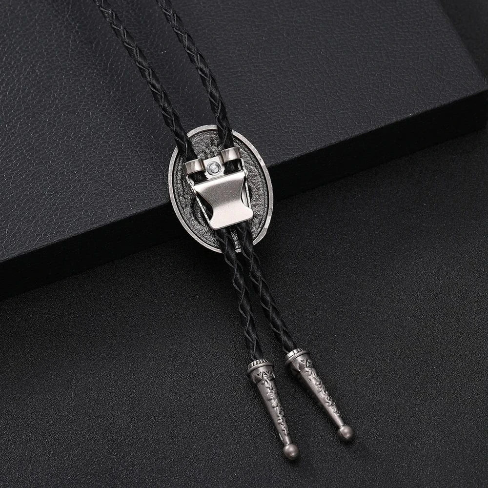 Bolo tie med ormmönster i antiksilver
